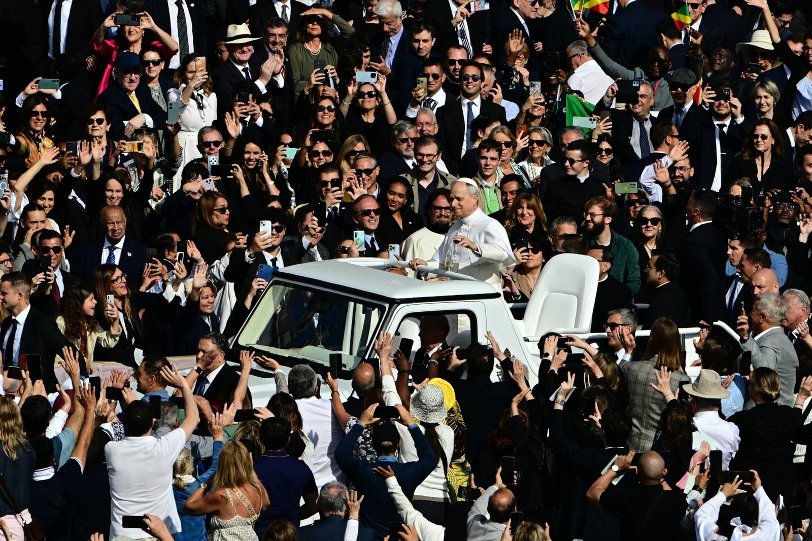 Pope Leo XIV celebrates the inaugural Mass after touring the Plaza de San Pedro in Popemobile

