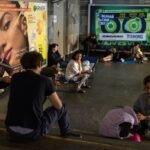 Photo: People take refuge in a subway station during a Russian drone attack in Kyiv