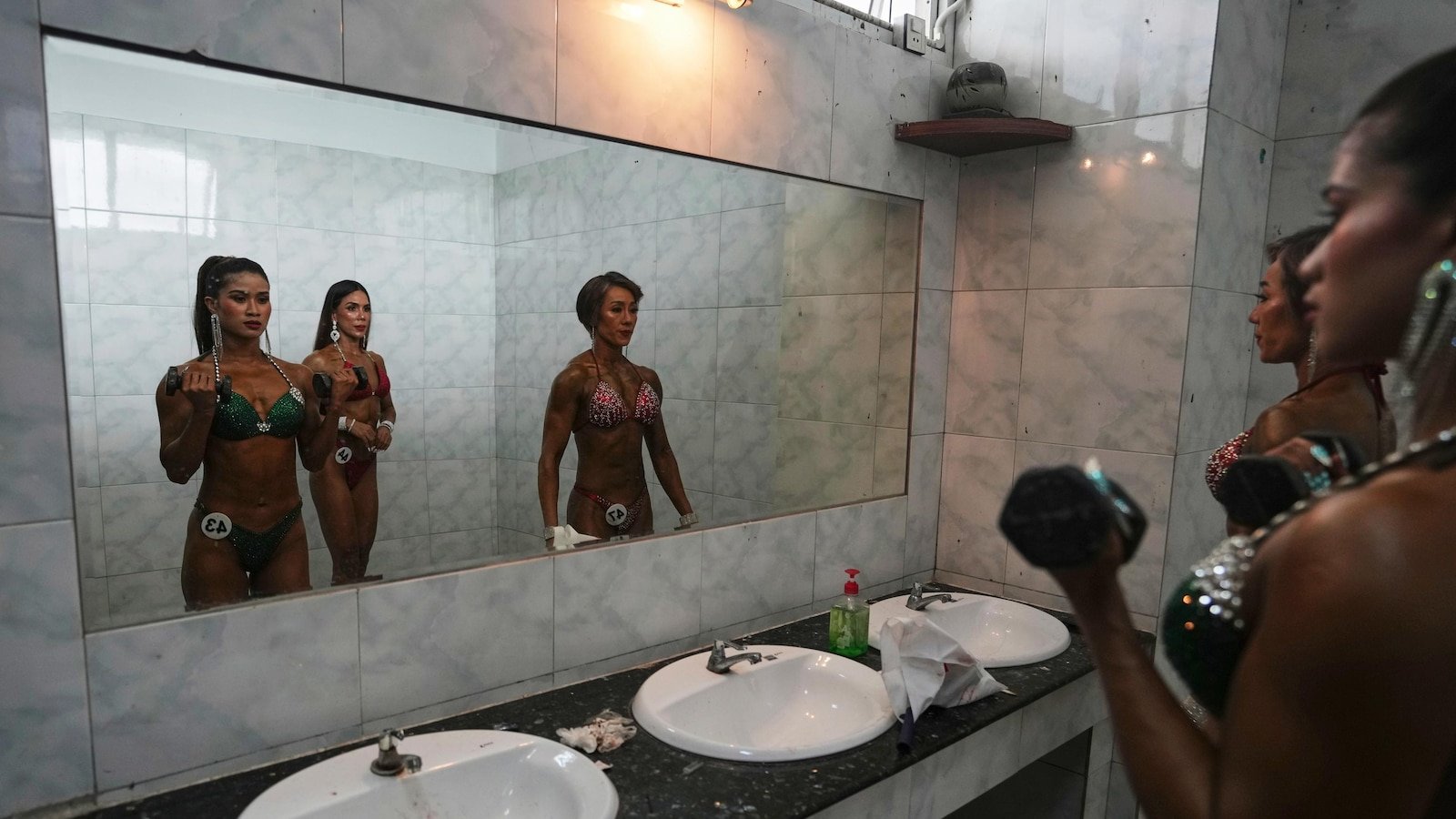 Photos show a bodybuilding competition in Myanmar