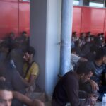 Photos show migrants intercepted near Crete arrive at Greek port of Lavrio from Libya